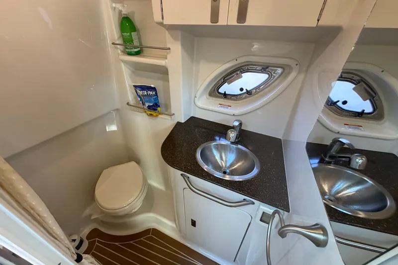 Slide: The Image of Bathroom interior of 2012 Sea Ray Sundancer 330 yacht with sink and toilet. - 16