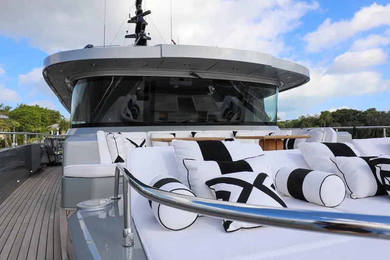 Slide: The Image of Luxurious 2025 Majesty 120 yacht with elegant deck seating and modern design. - 24