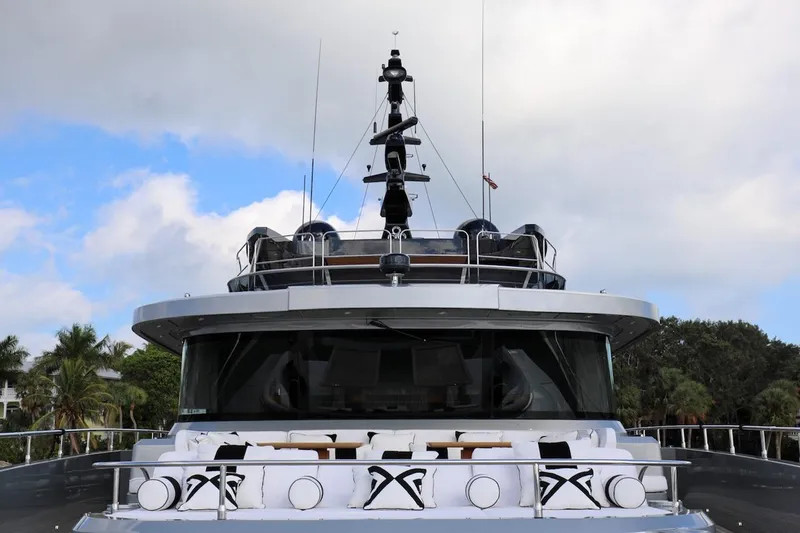 Slide: The Image of Majesty 120 yacht, 2025 model, front view with luxurious deck seating. - 22