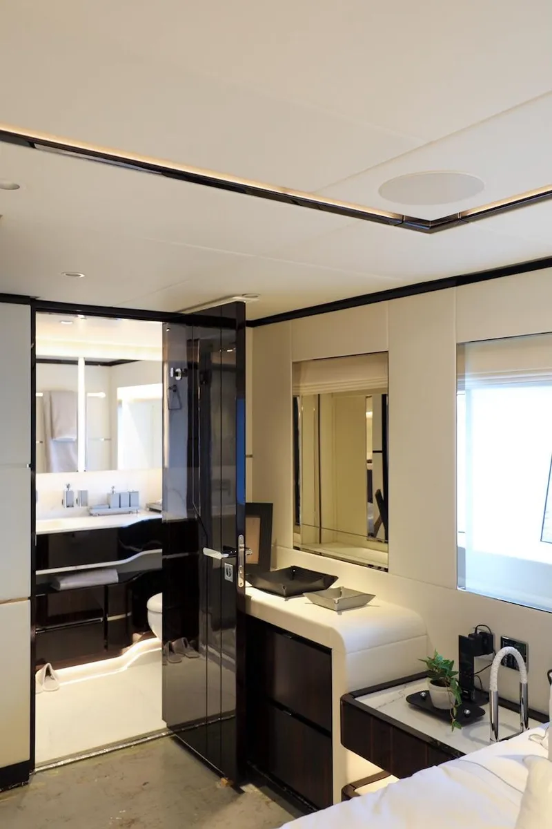 Slide: The Image of Luxurious interior of 2025 Majesty 120 yacht, featuring modern design and elegant furnishings. - 54