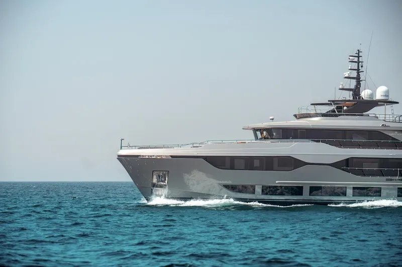 Slide: The Image of Luxury Majesty 120 yacht cruising on open sea, 2025 model. - 12