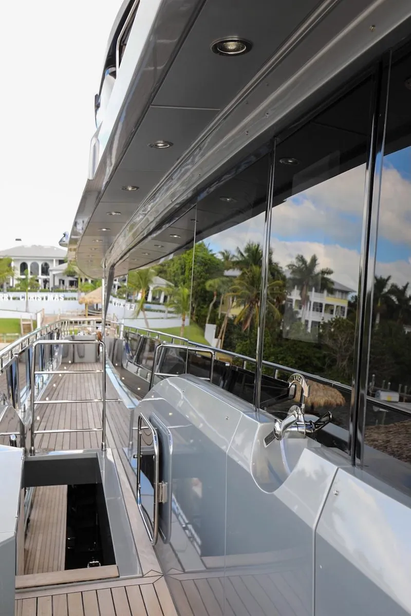 Slide: The Image of Side view of 2025 Majesty 120 yacht with sleek design and modern architecture. - 26
