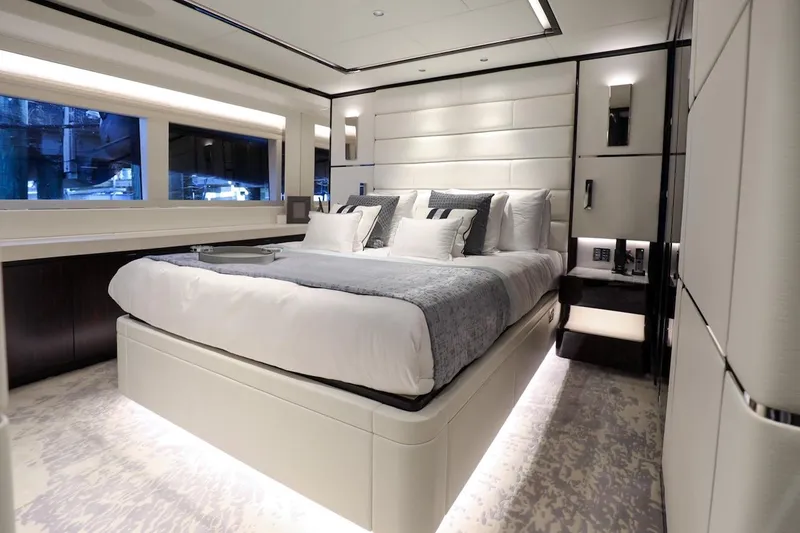 Slide: The Image of Luxurious bedroom interior of 2025 Majesty 120 yacht, featuring modern design and elegant furnishings. - 46