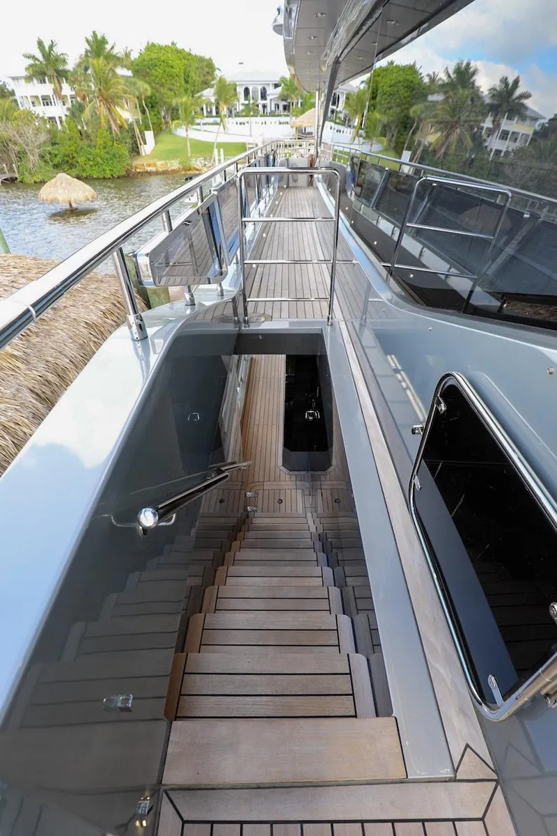 Slide: The Image of Luxurious 2025 Majesty 120 yacht deck with sleek design and modern amenities. - 27