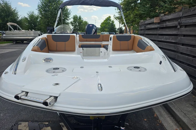 Slide: The Image of 2026 Tahoe 1950 boat with sleek design and comfortable seating. - 1