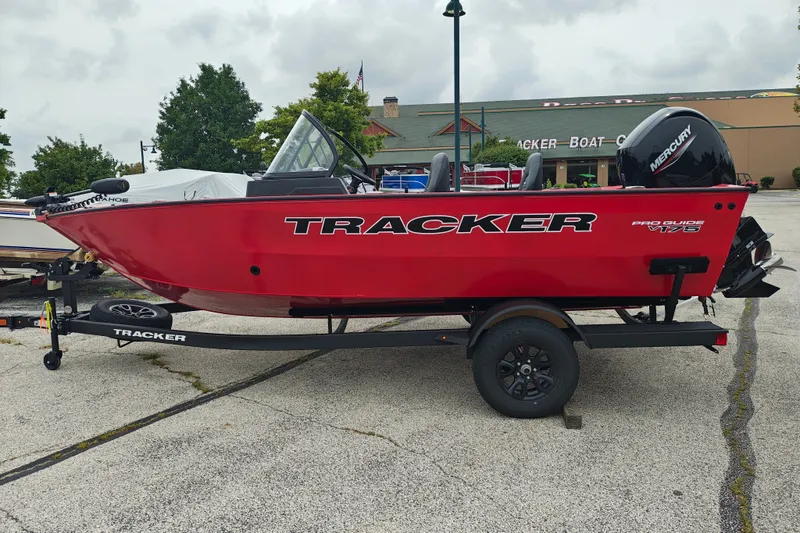The Image of 2026 Tracker Pro Guide V-175 WT boat in vibrant red on a trailer. - 1
