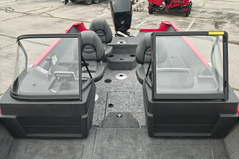 Slide: The Image of 2026 Tracker Pro Guide V-175 WT boat interior with dual consoles and seating. - 19