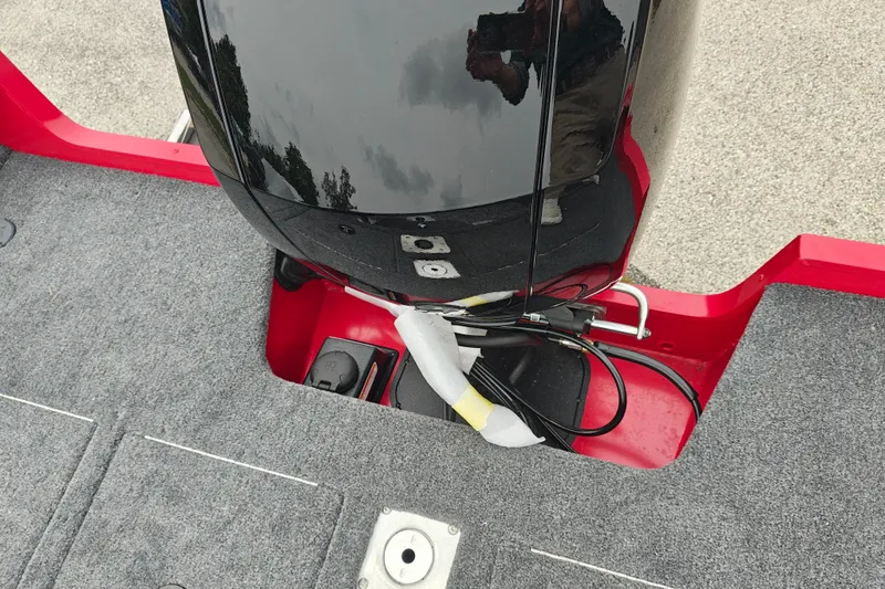 Slide: The Image of 2026 Tracker Pro Guide V-175 WT boat motor and deck, featuring red and gray design. - 24