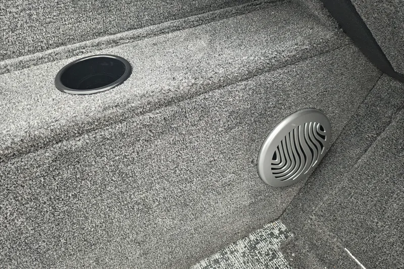 Slide: The Image of Interior of 2026 Tracker Pro Guide V-175 WT boat with speaker and cup holder. - 15