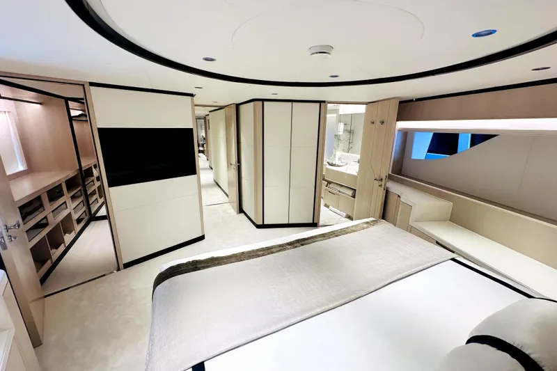 Slide: The Image of Luxurious interior of 2023 Majesty 120 yacht, featuring modern design and elegant furnishings. - 24