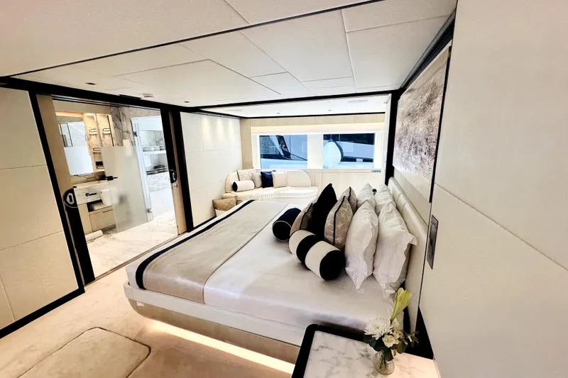 Slide: The Image of Luxurious bedroom interior of 2023 Majesty 120 yacht with modern design and elegant decor. - 49