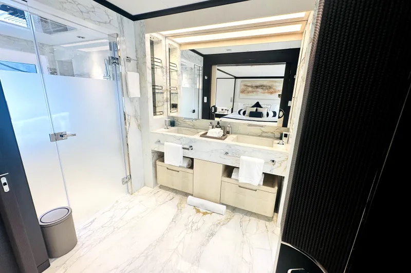 Slide: The Image of Luxurious marble bathroom in 2023 Majesty 120 yacht, featuring modern fixtures and elegant design. - 44