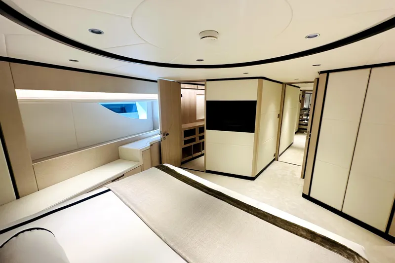Slide: The Image of Luxurious interior of 2023 Majesty 120 yacht, featuring modern design and elegant furnishings. - 25