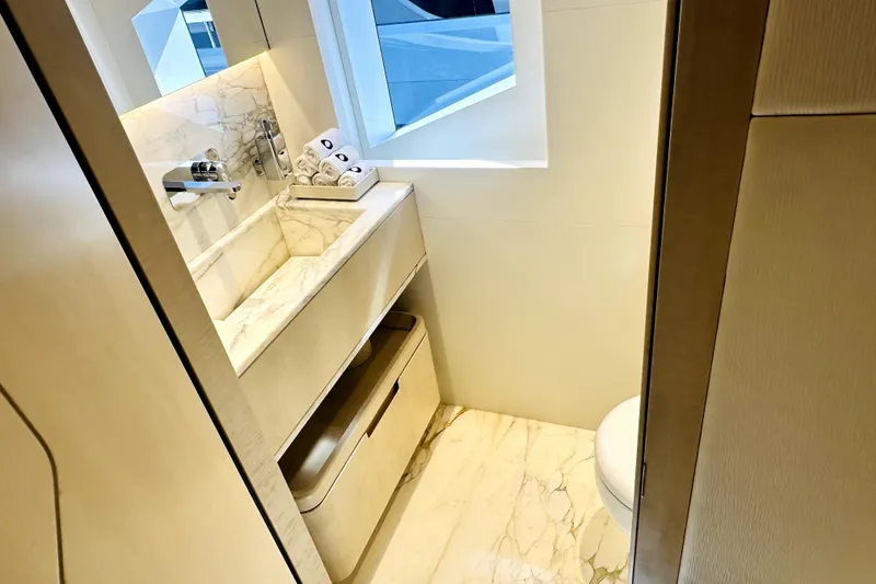 Slide: The Image of Luxurious bathroom in 2023 Majesty 120 yacht with marble sink and modern fixtures. - 42