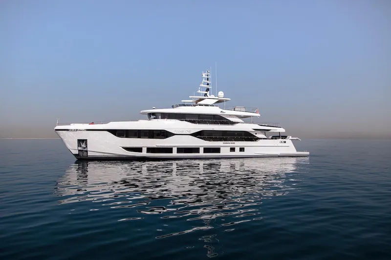 The Image of Luxurious 2024 Majesty 120 yacht on calm sea under clear blue sky. - 2