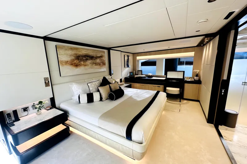 Slide: The Image of Luxurious bedroom interior of 2023 Majesty 120 yacht, featuring modern design and elegant decor. - 48