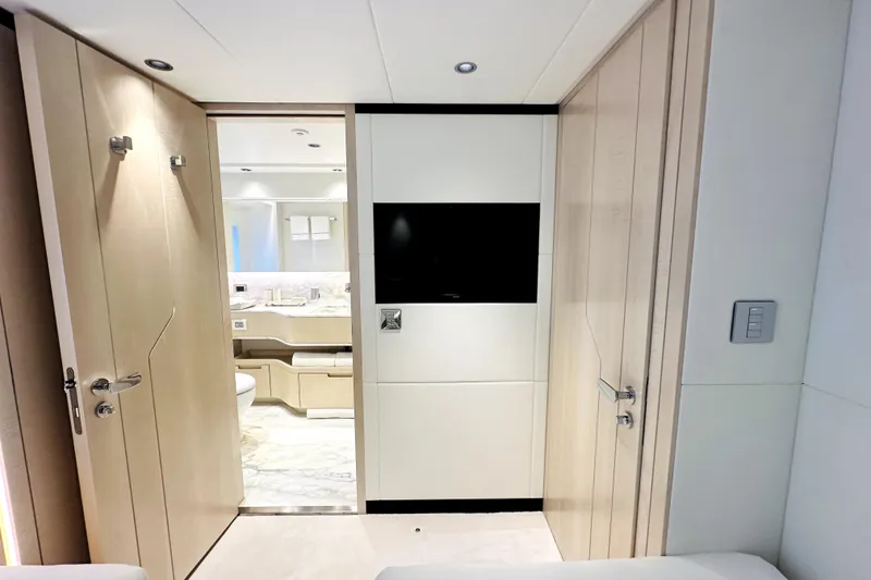Slide: The Image of Luxurious interior of 2023 Majesty 120 yacht featuring modern bathroom and sleek design elements. - 30