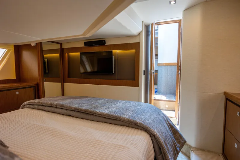 Slide: The Image of Luxurious bedroom interior of 2017 Sea Ray Fly 510 yacht with modern amenities. - 43
