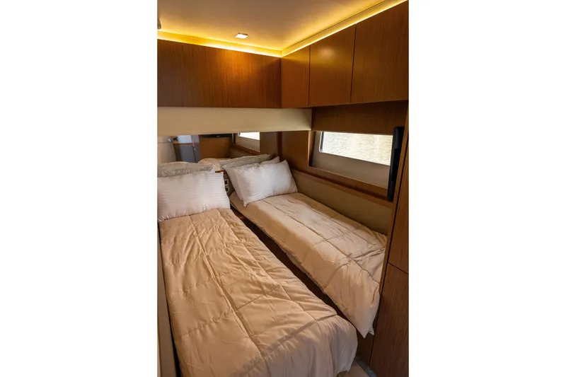 Slide: The Image of Luxurious twin cabin interior on 2017 Sea Ray Fly 510 yacht. - 38