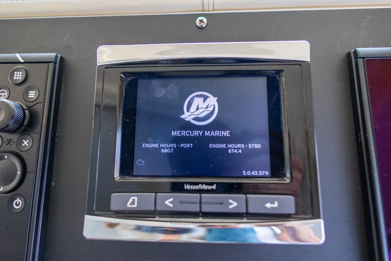 Slide: The Image of Mercury Marine engine display on 2017 Sea Ray Fly 510, showing engine hours. - 54