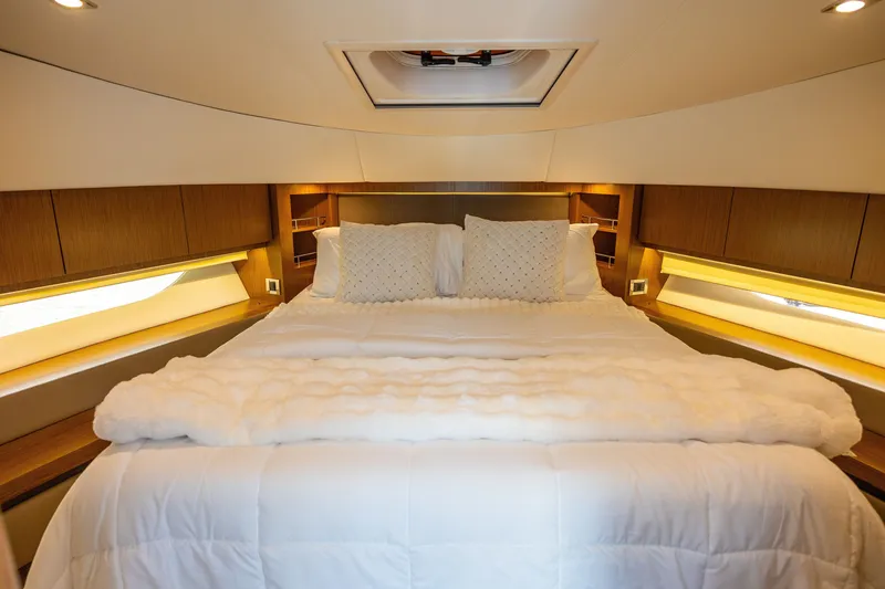 Slide: The Image of Luxurious bedroom interior of 2017 Sea Ray Fly 510 yacht with elegant bedding. - 37