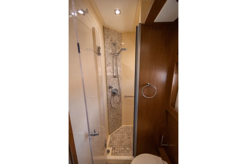 Slide: The Image of Luxurious bathroom in 2017 Sea Ray Fly 510 yacht with modern shower design. - 49