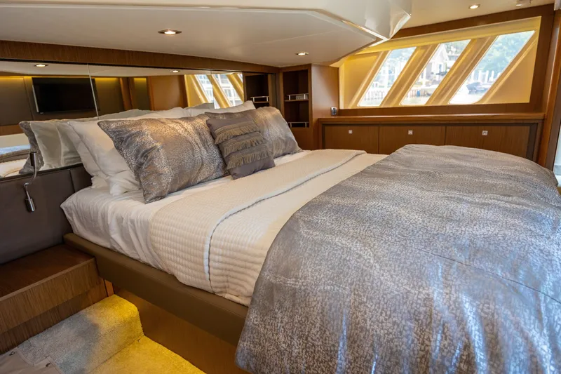 Slide: The Image of Luxurious bedroom interior of 2017 Sea Ray Fly 510 yacht with elegant bedding and modern design. - 40