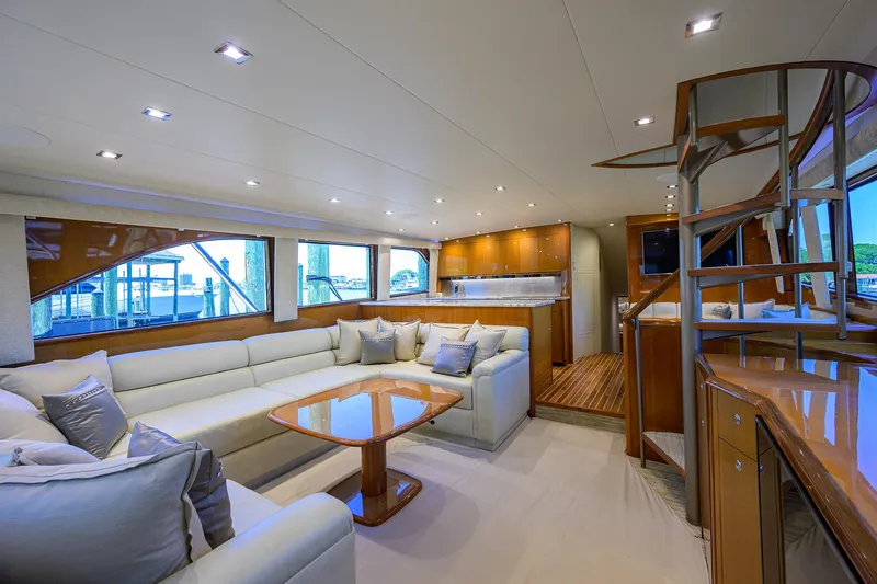 Slide: The Image of Luxurious interior of 2004 Viking 65 Enclosed Bridge yacht with modern furnishings. - 15