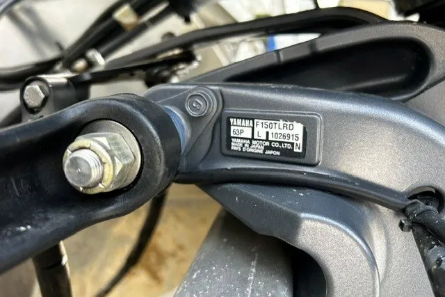 Slide: The Image of Close-up of Yamaha motor part on 2005 Godfrey SANPAN 2500 boat. - 14