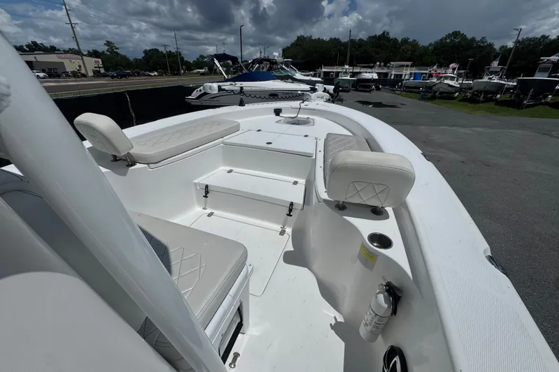 Slide: The Image of 2019 Blue Wave 2800 Pure Hybrid boat interior with seating and storage compartments. - 43