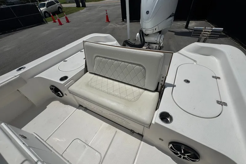 Slide: The Image of 2019 Blue Wave 2800 Pure Hybrid boat interior with cushioned seating and storage compartments. - 33