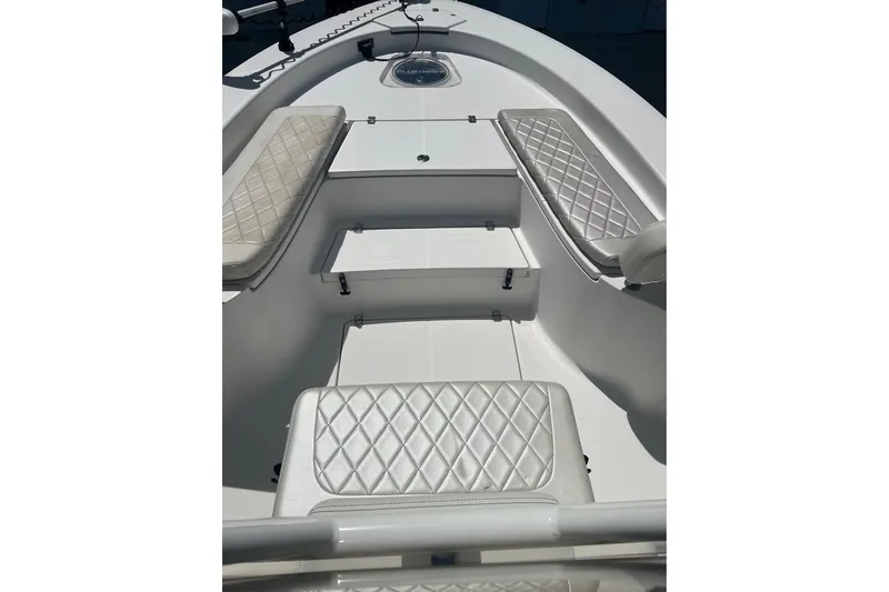 Slide: The Image of 2019 Blue Wave 2800 Pure Hybrid boat interior with diamond-stitched seating. - 6