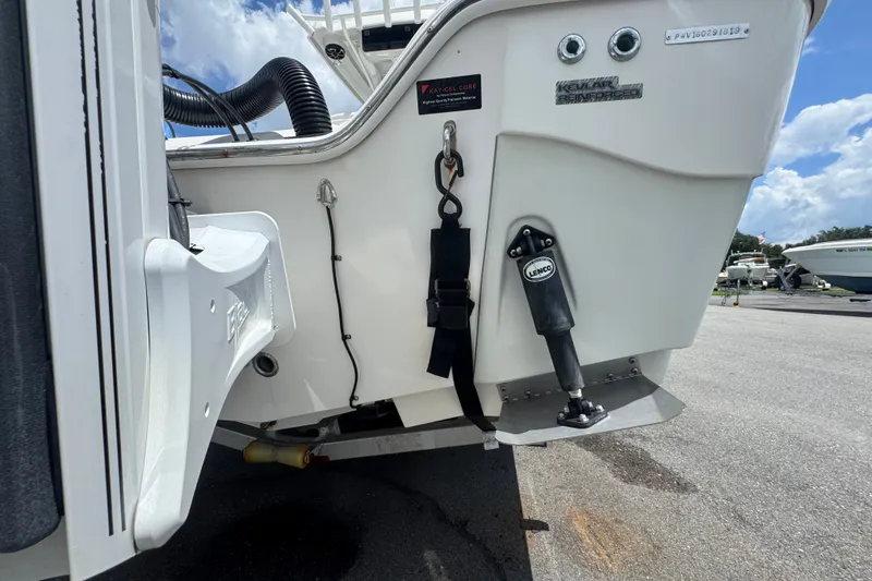 Slide: The Image of 2019 Blue Wave 2800 Pure Hybrid boat stern with Lenco trim tab and accessories. - 27