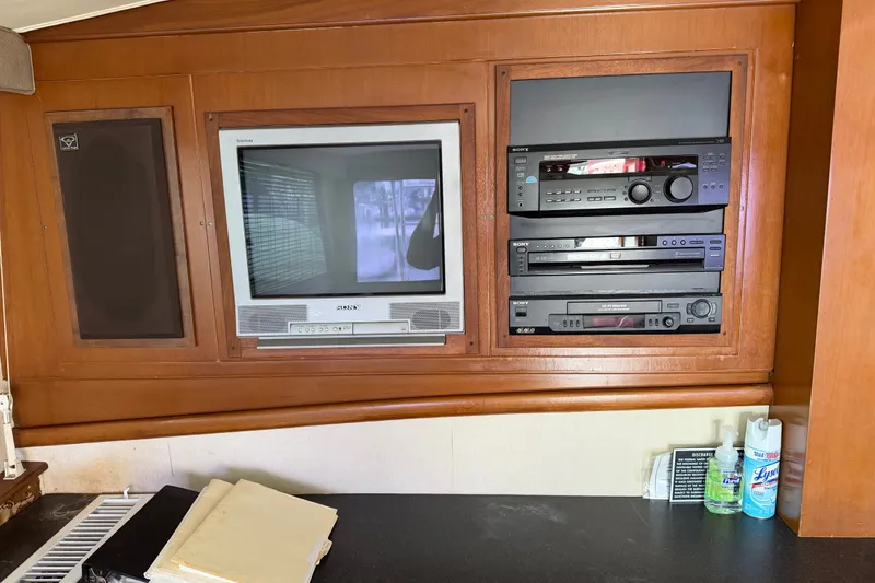 Slide: The Image of Vintage entertainment system on 1967 Hatteras 41 Convertible yacht with TV and audio equipment. - 4