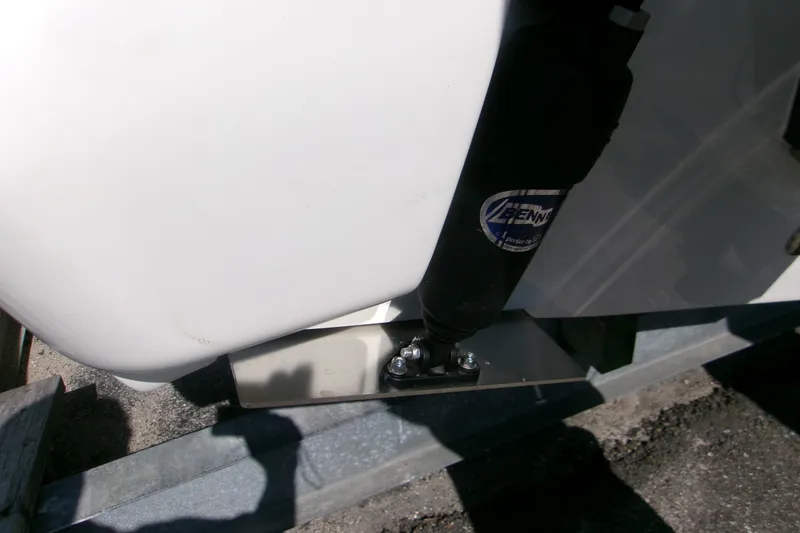 Slide: The Image of Trim tab installation on a 2027 Key West 244 Center Console boat. - 4