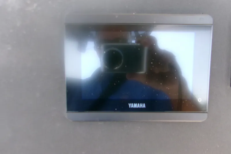 Slide: The Image of Yamaha display screen on 2027 Key West 244 Center Console boat dashboard. - 12