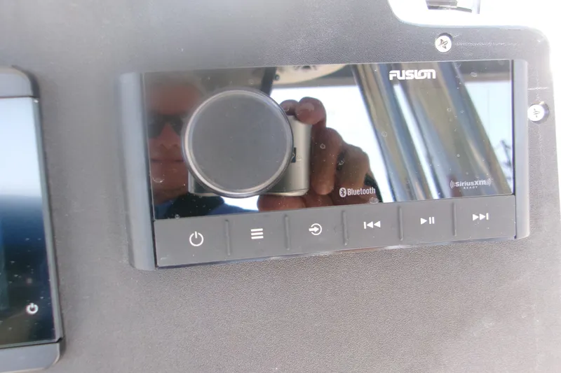 Slide: The Image of Fusion marine stereo system on Key West 244 Center Console, 2027 model. - 11