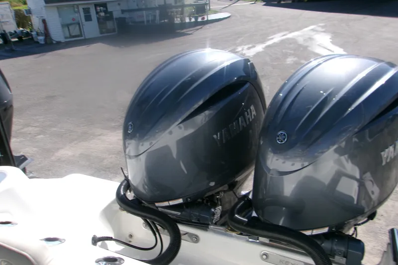 Slide: The Image of Twin Yamaha outboard engines on a 2027 Key West 244 Center Console boat. - 7