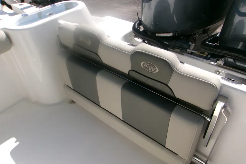 Slide: The Image of 2027 Key West 244 Center Console boat seat with KW logo, featuring sleek design and modern upholstery. - 8