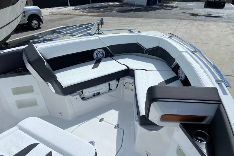 Slide: The Image of Luxurious seating area on a 2027 Monterey Elite 30 OB boat, featuring sleek design and comfort. - 21