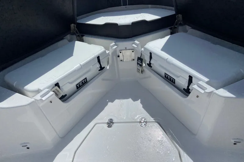 Slide: The Image of Interior of 2027 Monterey Elite 30 OB boat with Yeti coolers. - 22