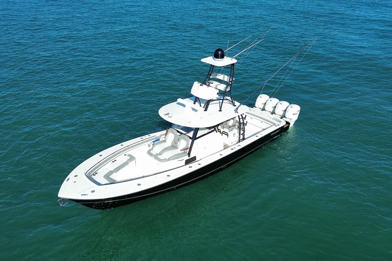 The Image of 2024 Regulator 41 boat on open water, featuring multiple outboard engines. - 1