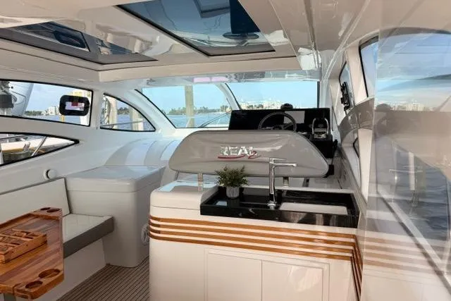 Slide: The Image of Luxurious interior of 2025 Real 40 HT yacht with modern design and amenities. - 15