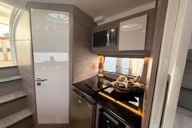 Slide: The Image of Modern kitchen interior of 2025 Real 40 HT Luxury yacht with sleek design and appliances. - 31