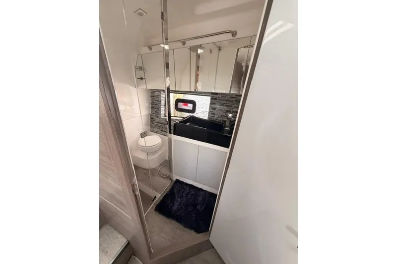 Slide: The Image of Luxurious bathroom interior of 2025 Real 40 HT Luxury yacht, featuring modern fixtures and elegant design. - 44