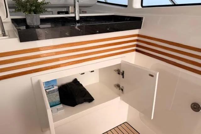 Slide: The Image of Luxurious interior of 2025 Real 40 HT yacht with sleek cabinetry and modern design. - 26