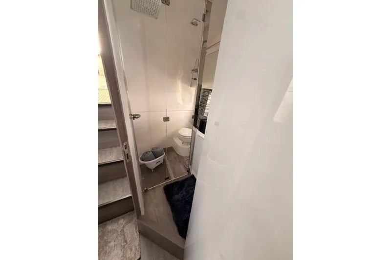 Slide: The Image of Compact bathroom in 2025 Real 40 HT Luxury yacht, featuring modern fixtures and sleek design. - 45