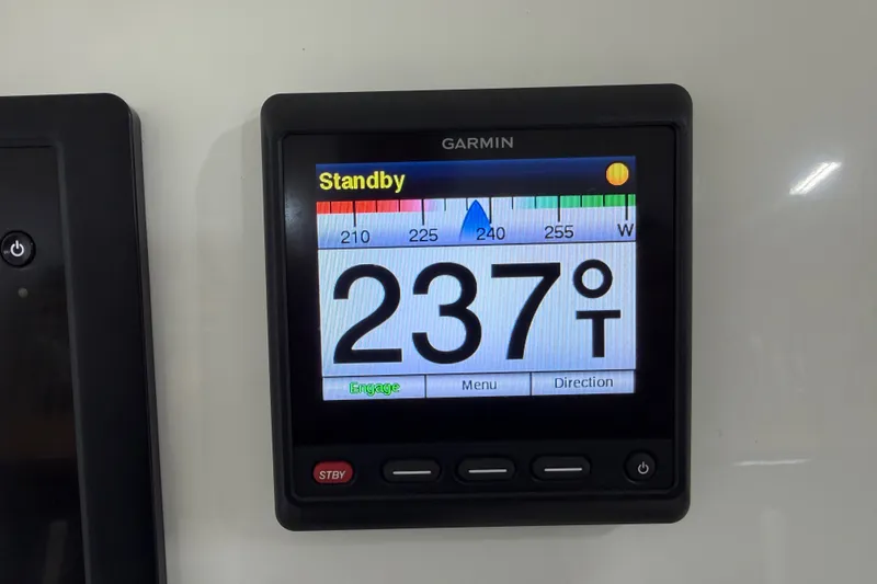 Slide: The Image of Garmin display showing 237° heading on a 2015 Regulator 23 boat. - 33