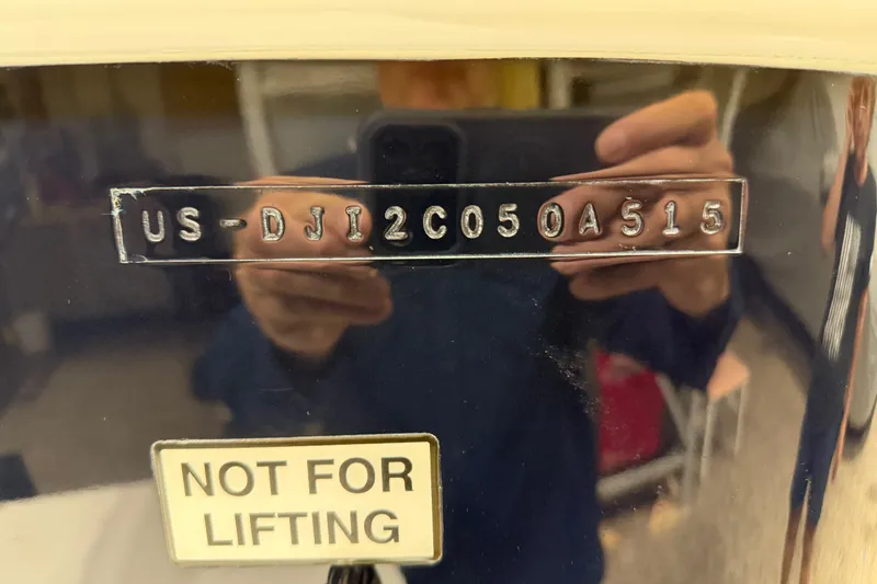Slide: The Image of 2015 Regulator 23 boat hull identification number with "Not for Lifting" label. - 50