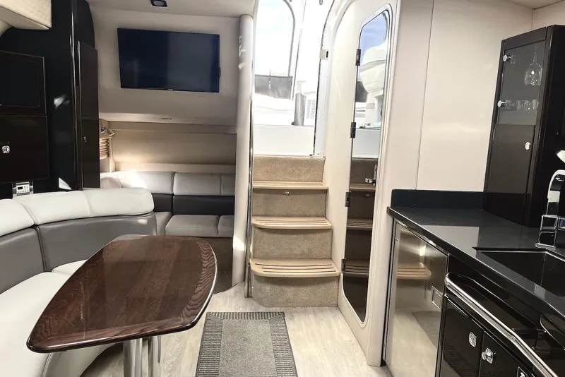 Slide: The Image of Interior of a 2016 Formula 37 Performance Cruiser with modern furnishings and sleek design. - 4